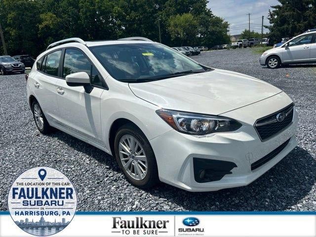 2018 Subaru Impreza 2.0i Premium 5-door CVT in Crystal White Pearl — front three-quarter view