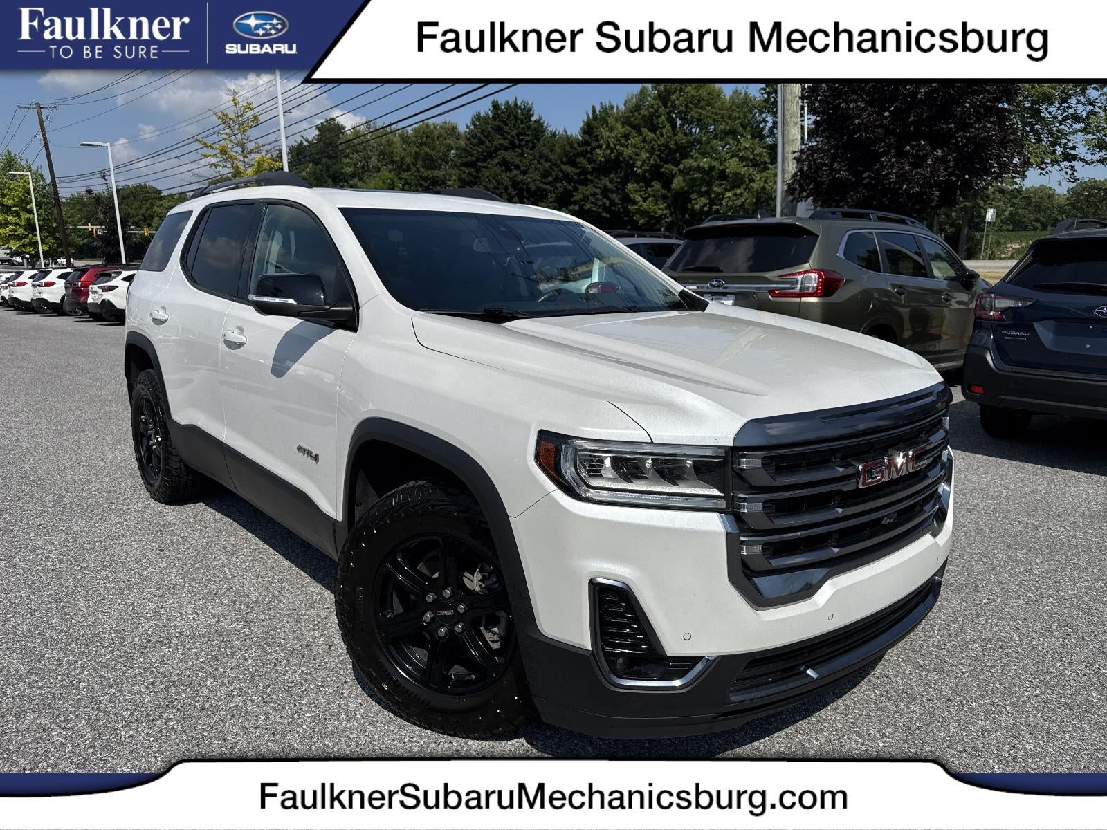 2022 GMC Acadia AWD AT4 in White Frost Tricoat — front three-quarter view