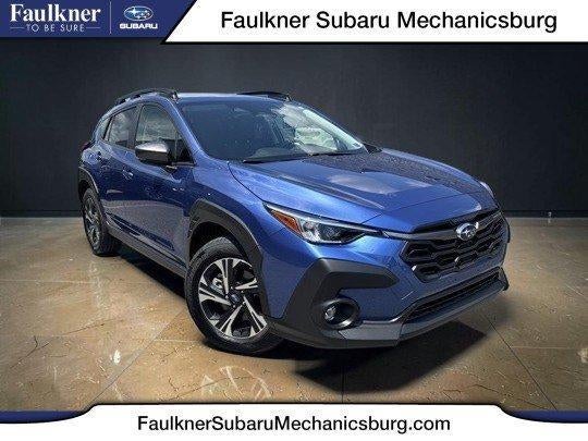 2025 Subaru Crosstrek Premium AWD in Daybreak Blue Pearl — front three-quarter view