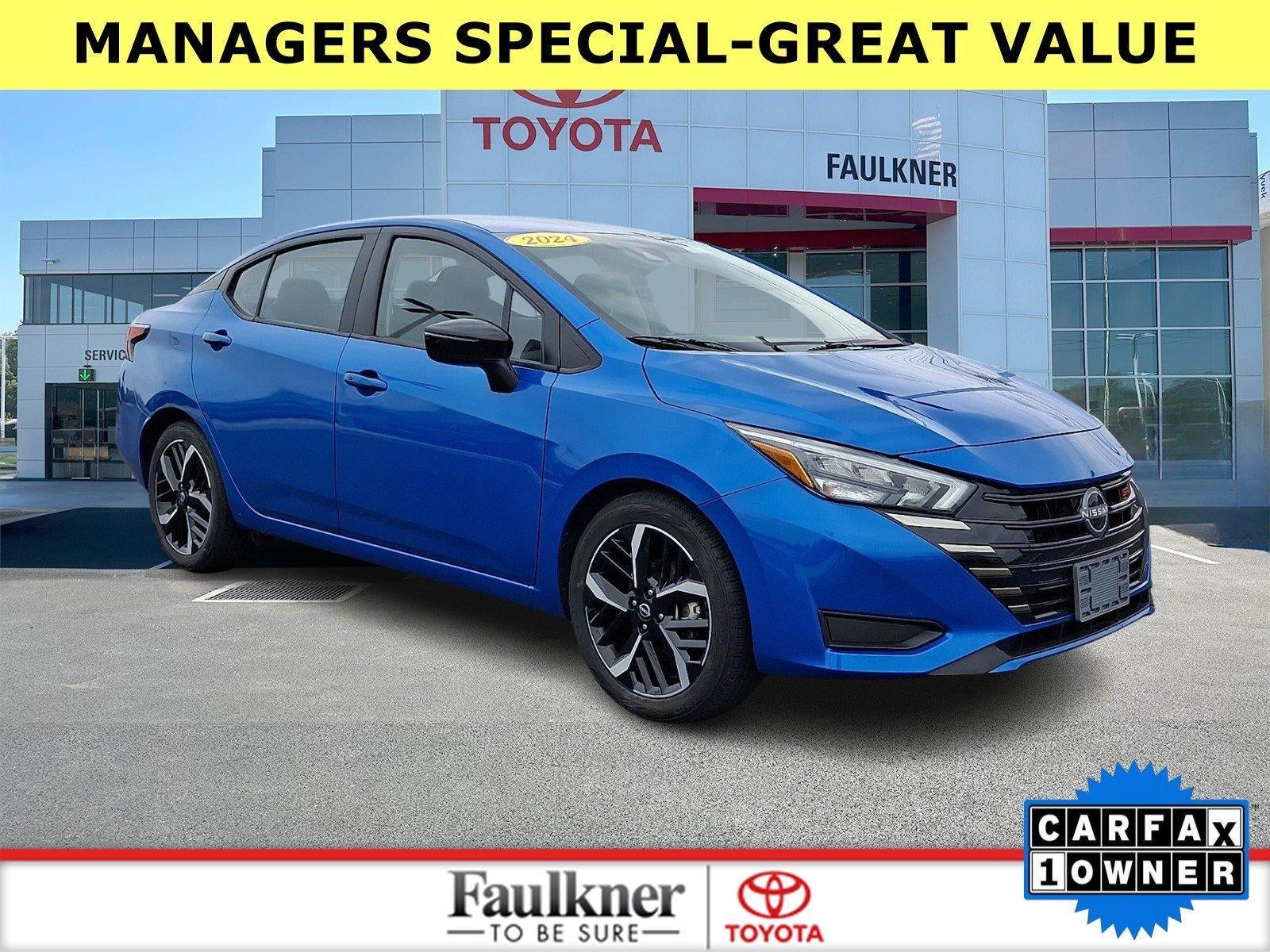 2024 Nissan Versa SR CVT in Electric Blue Metallic — front three-quarter view