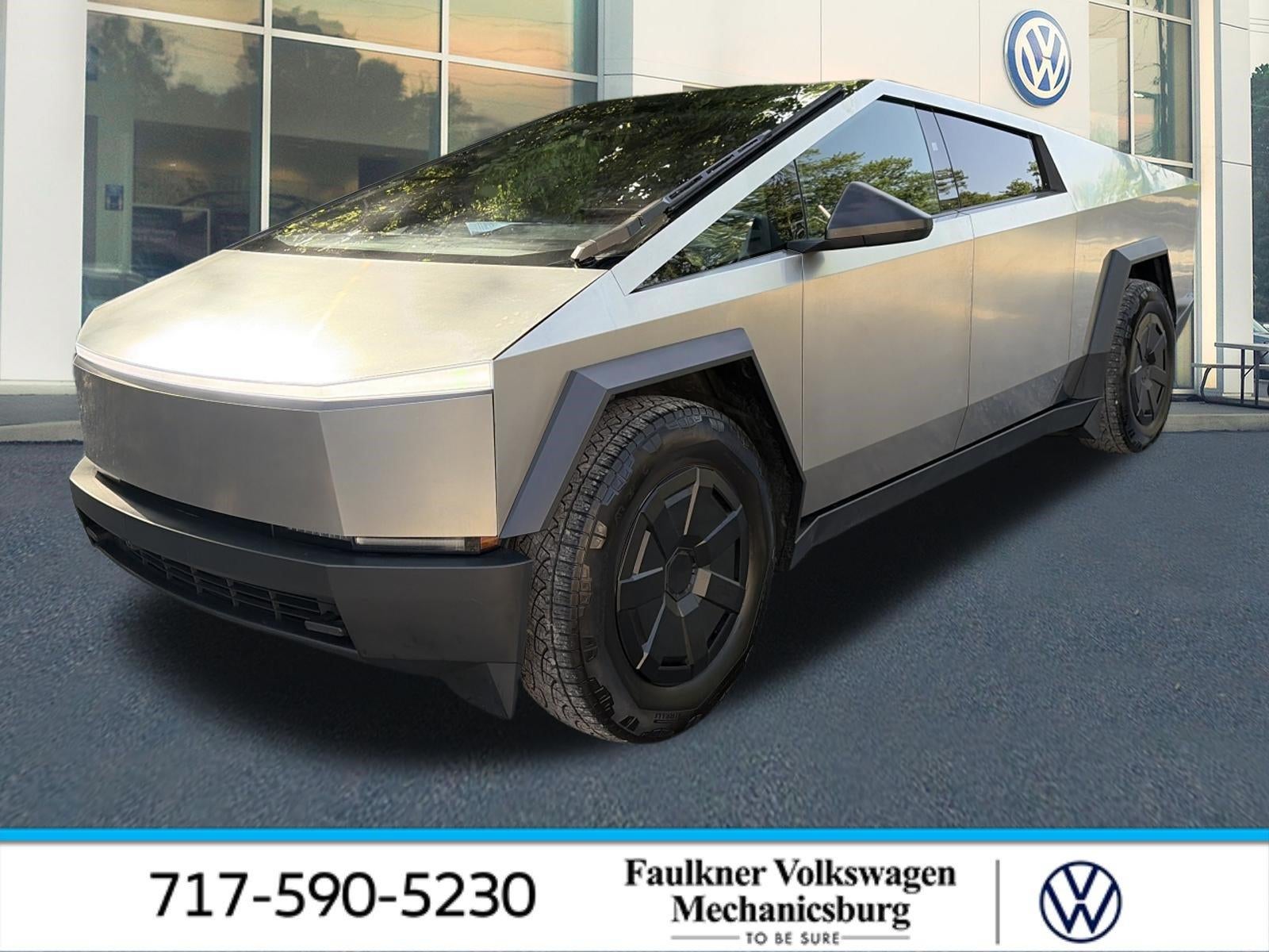 2024 Tesla Cybertruck AWD in Stainless Steel — front three-quarter view