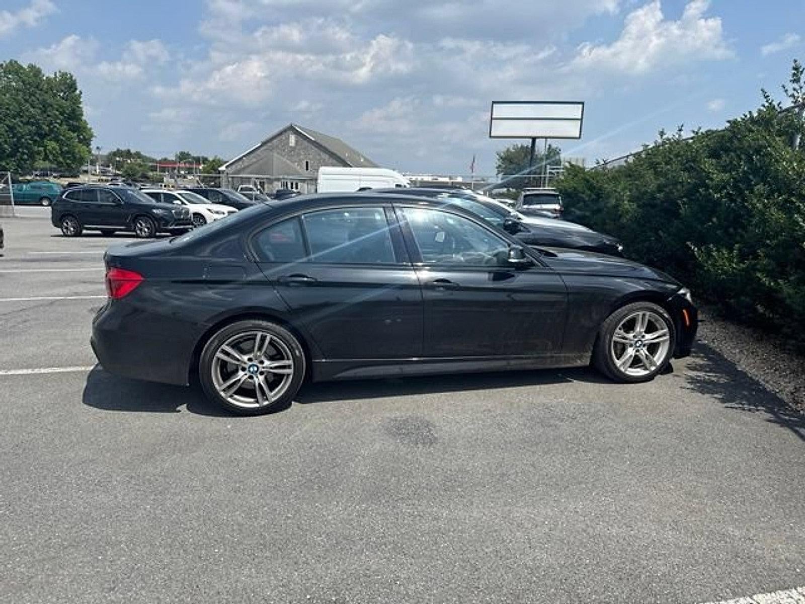 2016 BMW 328i xDrive — rear three-quarter view