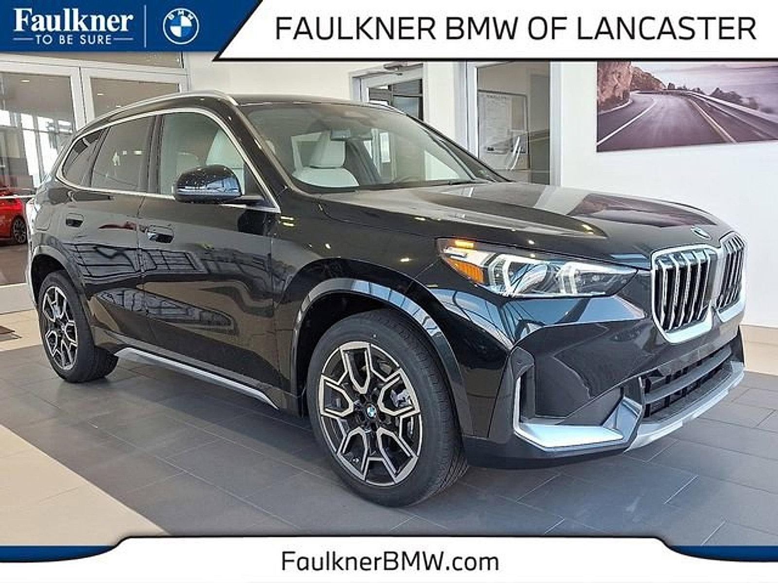 2026 BMW X1 xDrive28i Sports Activity Vehicle in Black Sapphire Metallic — front three-quarter view