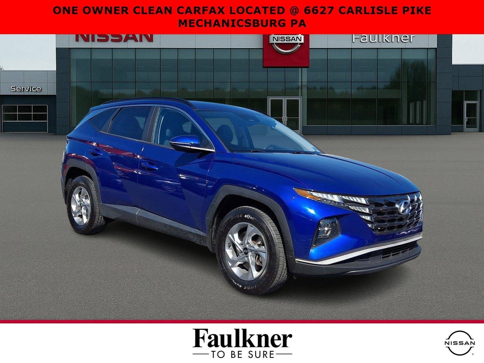 2022 Hyundai TUCSON SEL AWD in Intense Blue — front three-quarter view