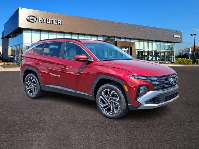 2026 Hyundai TUCSON SEL Plus AWD in Ultimate Red — front three-quarter view