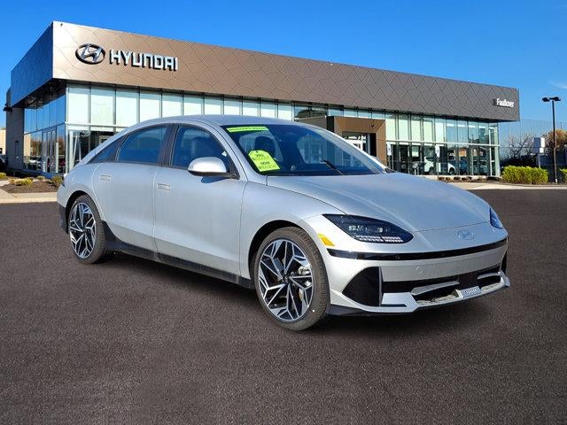 2024 Hyundai IONIQ 6 SEL in Gravity Gold Matte — front three-quarter view