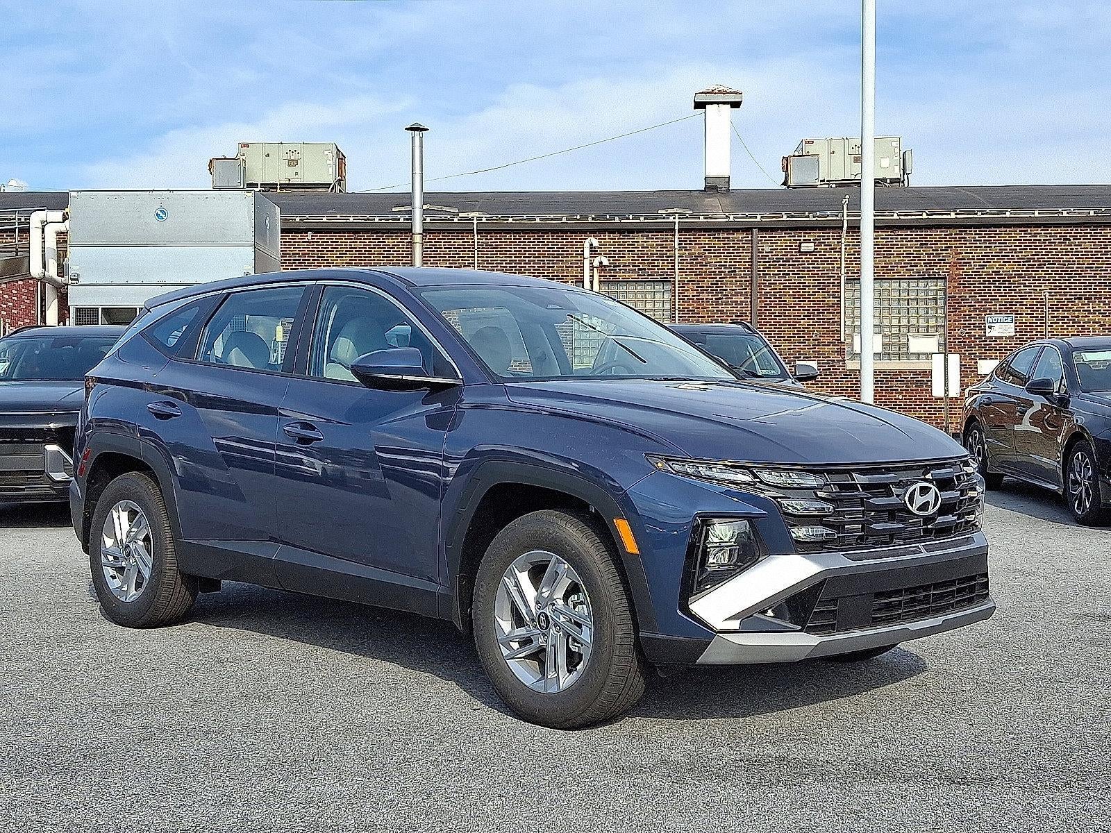 2026 Hyundai TUCSON — rear three-quarter view