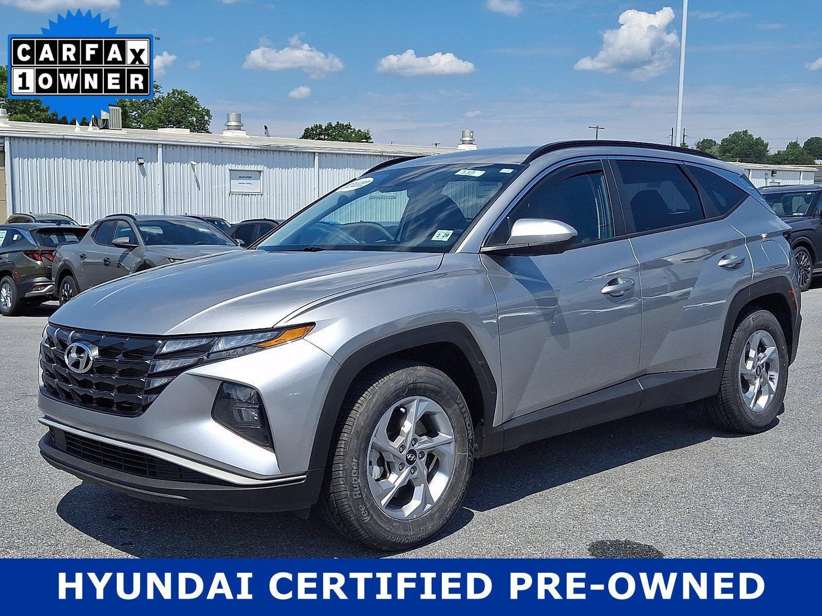 2024 Hyundai TUCSON SEL in Shimmering Silver — front three-quarter view