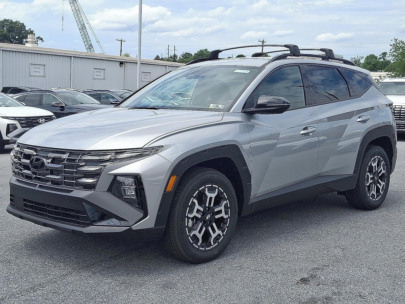 2025 Hyundai TUCSON XRT AWD in Shimmering Silver — front three-quarter view
